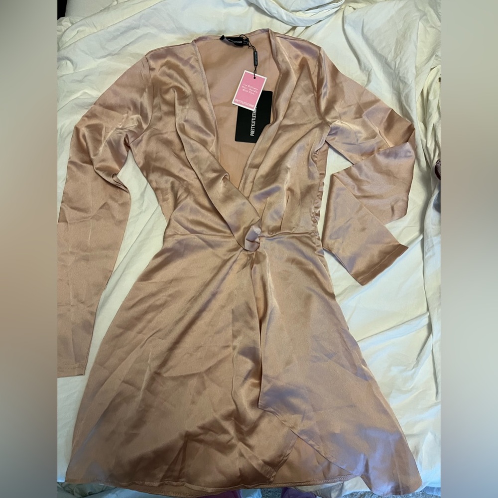 Soft pink mini, this dress has zero stretch so it is a true XS